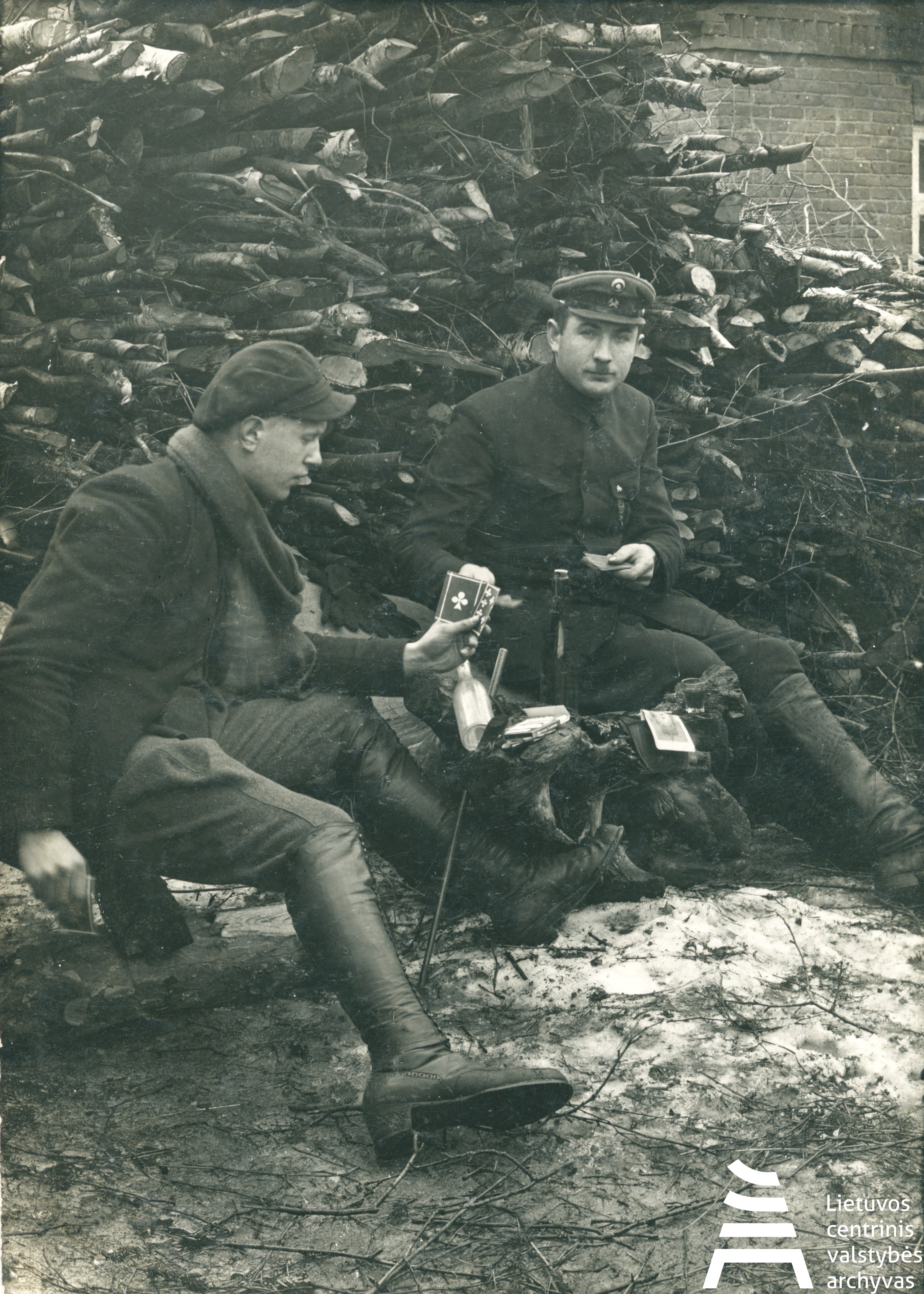Lithuanian Central State Archives, A border policeman Pranas Venckus playing cards with a friend. Laižuva, Mažeikiai district, Lithuania, 1922. P-30547.
